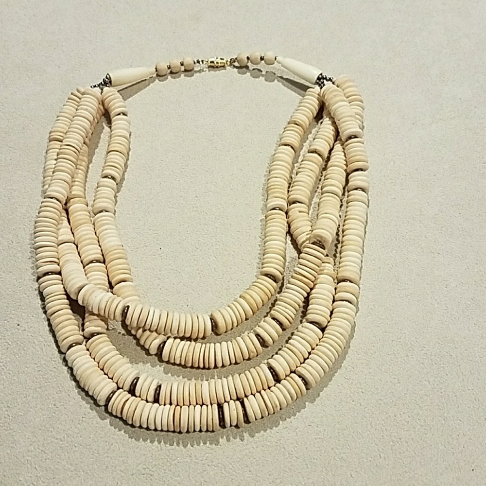 4 strand necklace with brown spacers